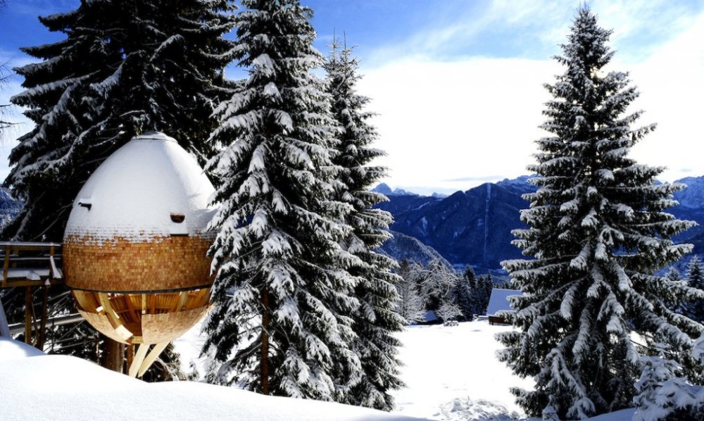 Cozy egg-shaped treehouses offer stunning views of the Italian Alps